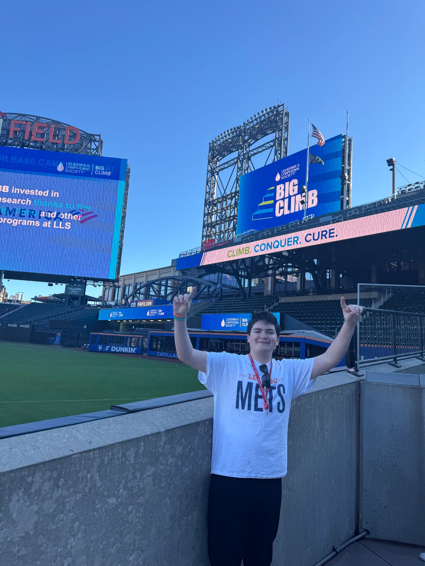 Gabriel Jaffe cheering at the Leukemia & Lymphoma Society Big Climb at Citi Field